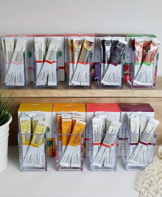 Various Flavours of EnergyFizz By Arbonne On Counter Shelf