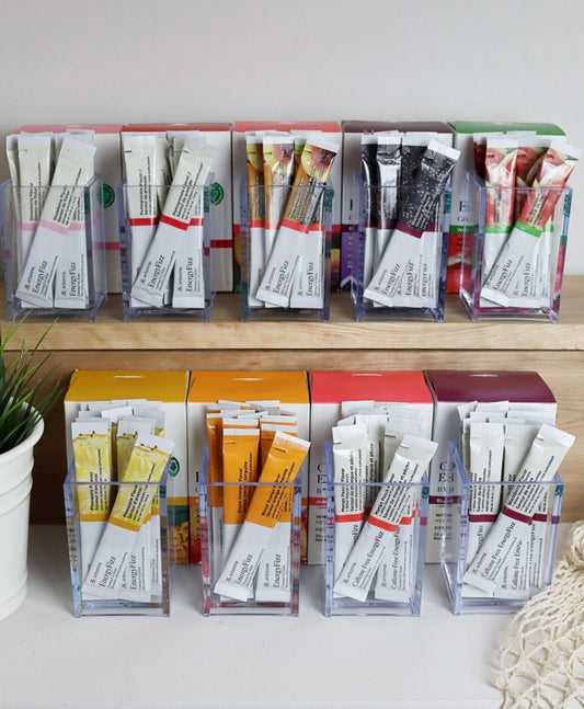 Various Flavours of EnergyFizz By Arbonne On Counter Shelf 