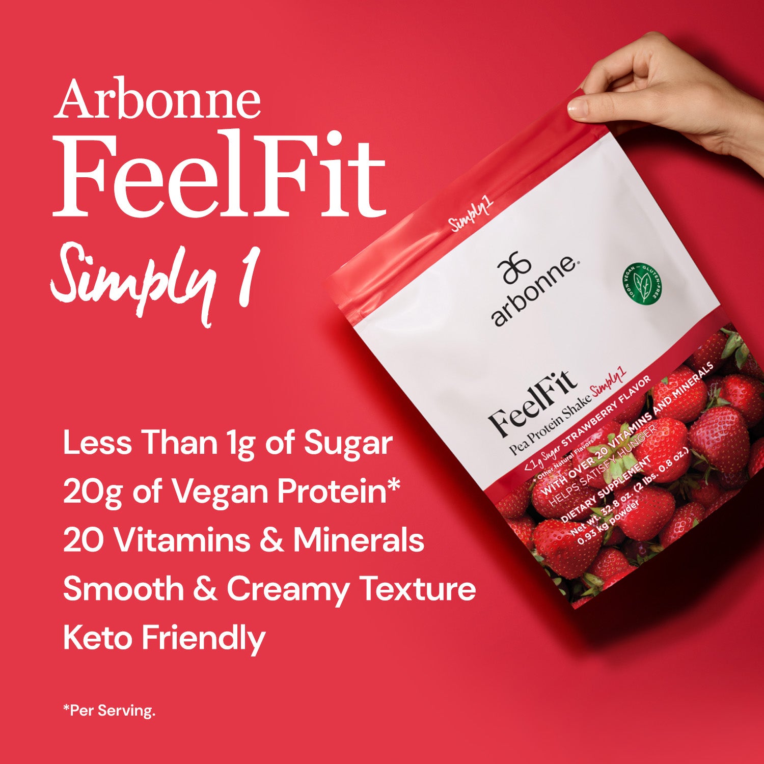 Hand holding Arbonne FeelFit Simply 1 strawberry-flavored pea protein shake package on a red background, highlighting less than 1g of sugar, 20g of vegan protein, 20 vitamins and minerals, smooth and creamy texture, and keto-friendly attributes.